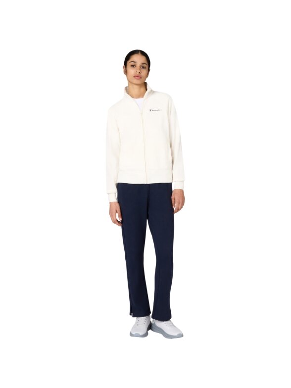Champion Full Zip Suit moteriškas sportinis kostiumas, kreminis ir tamsiai mėlynas 117988 YS084 Champion Full Zip Suit moteriškas sportinis kostiumas, kreminis ir tamsiai mėlynas 117988 YS084