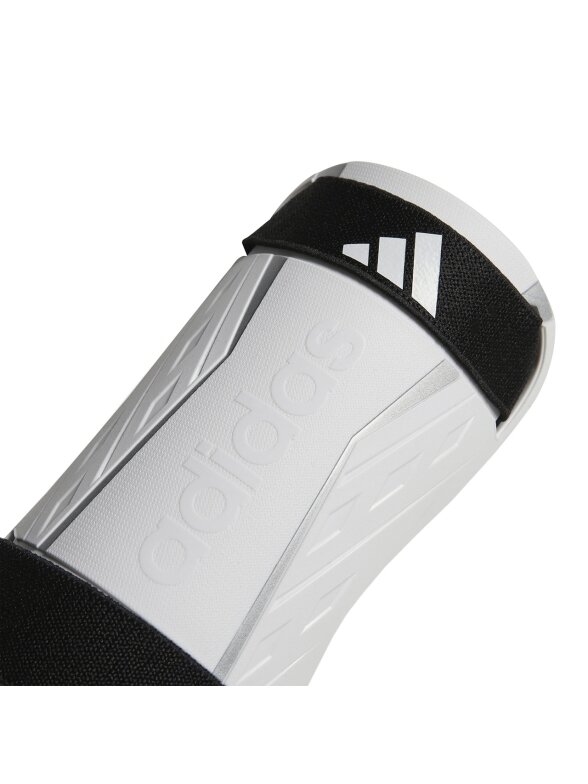 Adidas Tiro Training SG futbolo blauzdų apsaugos baltos ir juodos spalvos HN5605 1 Adidas Tiro Training SG futbolo blauzdų apsaugos baltos ir juodos spalvos HN5605 1