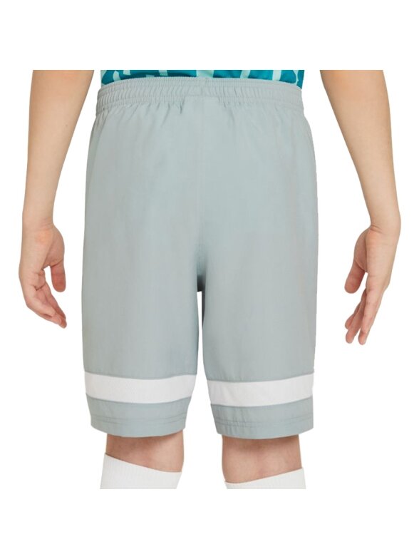 Nike NK Df Academy Shrt Wp Gx vaikiški šortai pilki CV1469 019 1 Nike NK Df Academy Shrt Wp Gx vaikiški šortai pilki CV1469 019 1