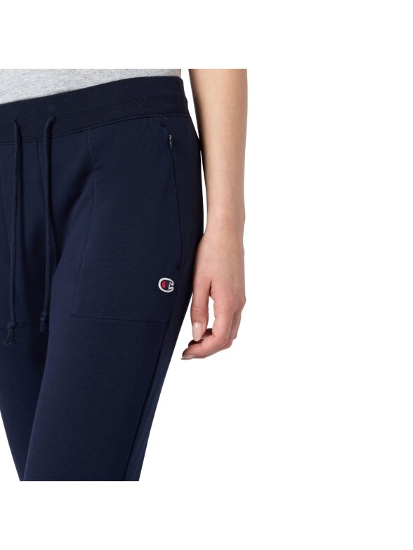 Champion Slim Pants moteriškos kelnės, tamsiai mėlynos spalvos 118041 BS501 3 Champion Slim Pants moteriškos kelnės, tamsiai mėlynos spalvos 118041 BS501 3