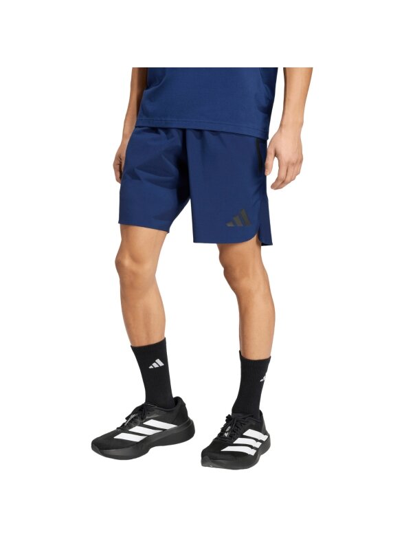 Vyriški šortai adidas Tiro Travel Woven tamsiai mėlyni KE8370 Vyriški šortai adidas Tiro Travel Woven tamsiai mėlyni KE8370